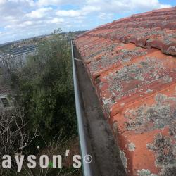 View Photo: Gutter clean out on two storey roofs