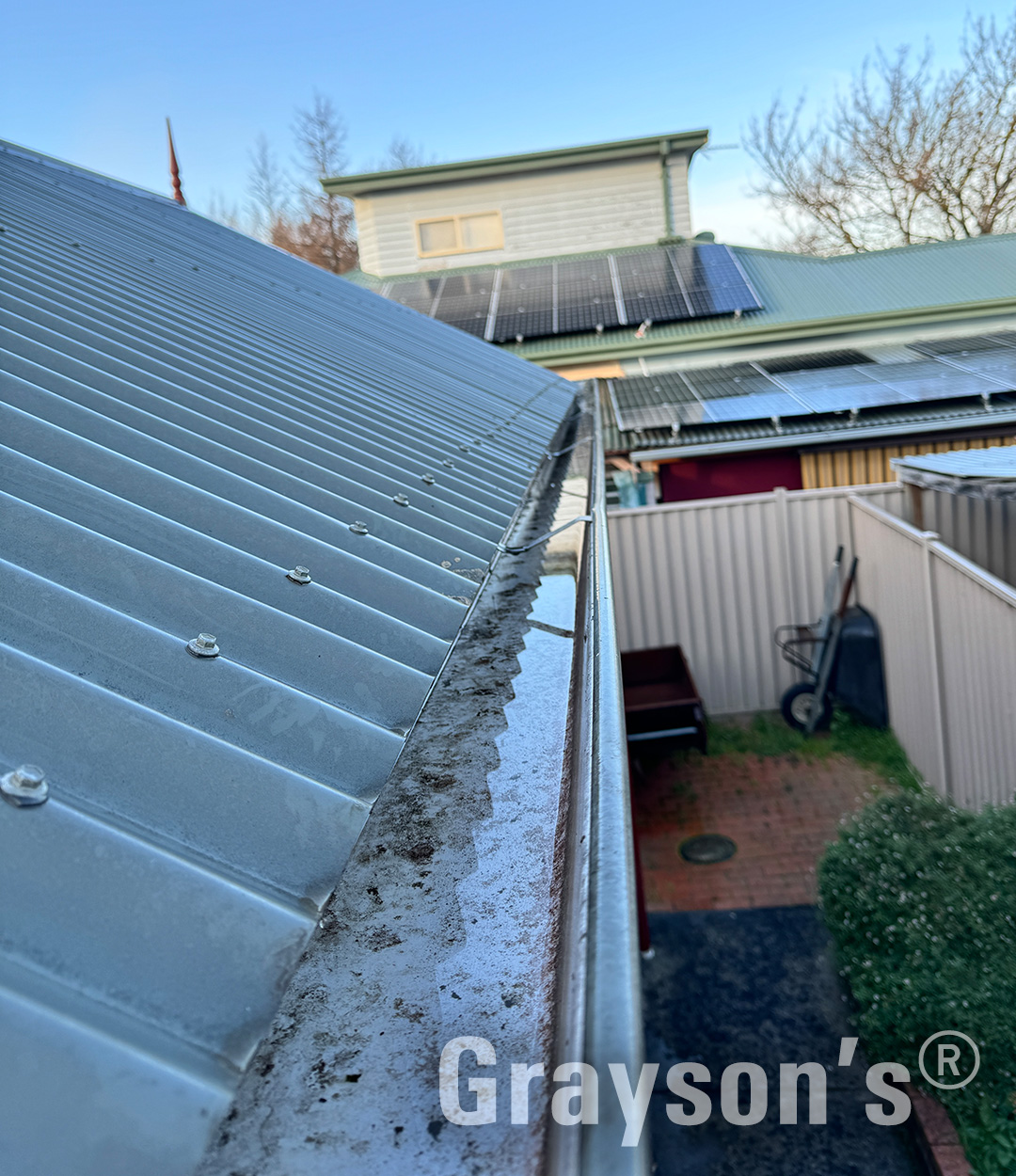 Corro roof with recently cleared gutters