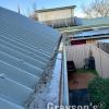 Corro roof with recently cleared gutters